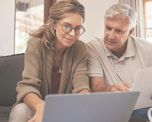 Retirement couple budget, finance and investment planning, loan and paper bills with laptop technology in home. Mature people money, cash savings or legal insurance document report on online bank.